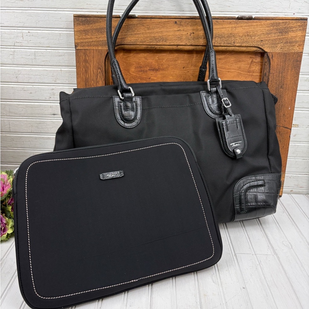 Tumi Black Travel Bag.  New without tags.